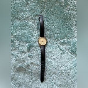 Lorus Disney Mickey Mouse golden and black watch. Shows wear and tear. OS